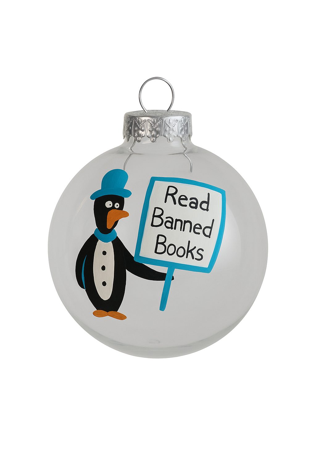 Hand-painted glass ornament of a penguin in a bright blue scarf, holding a small sign reading Read Banned Books.
